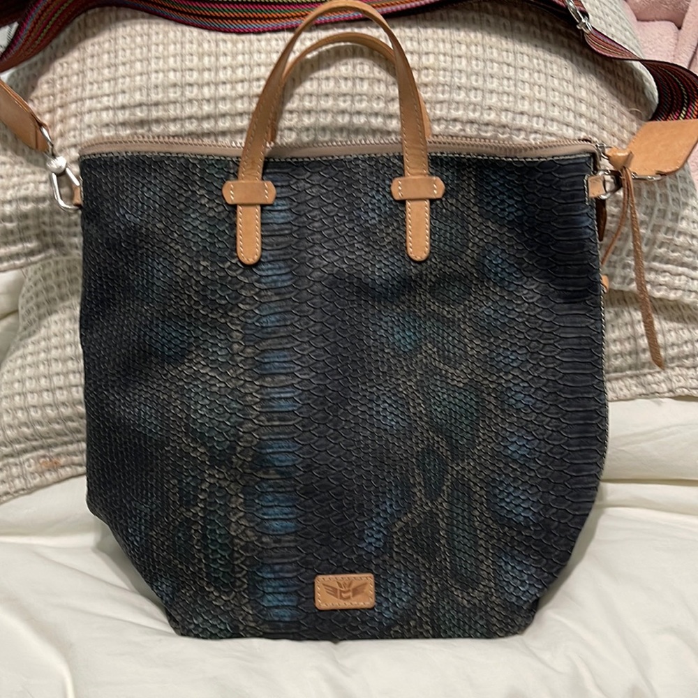 Consuela Rattler Sling is a versatile bucket bag